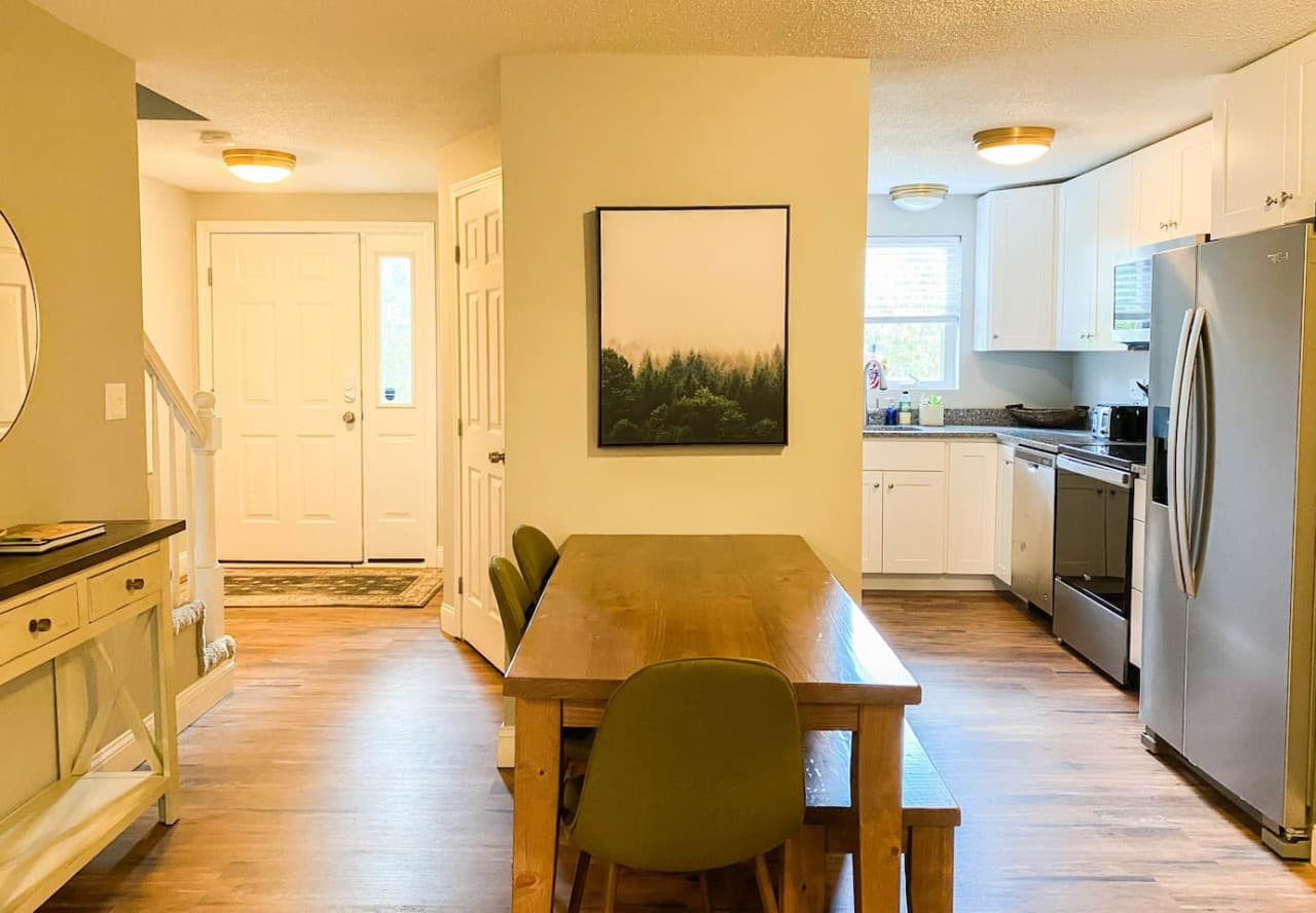 Custom wood farm table comfortably seats six people.
