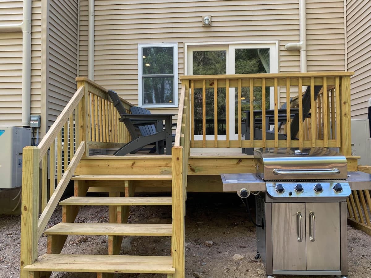 A large, brand-new grill for our guests' use. So that you know, the landscaping in the back is unfinished, but you are welcome to the fire pit behind the house.