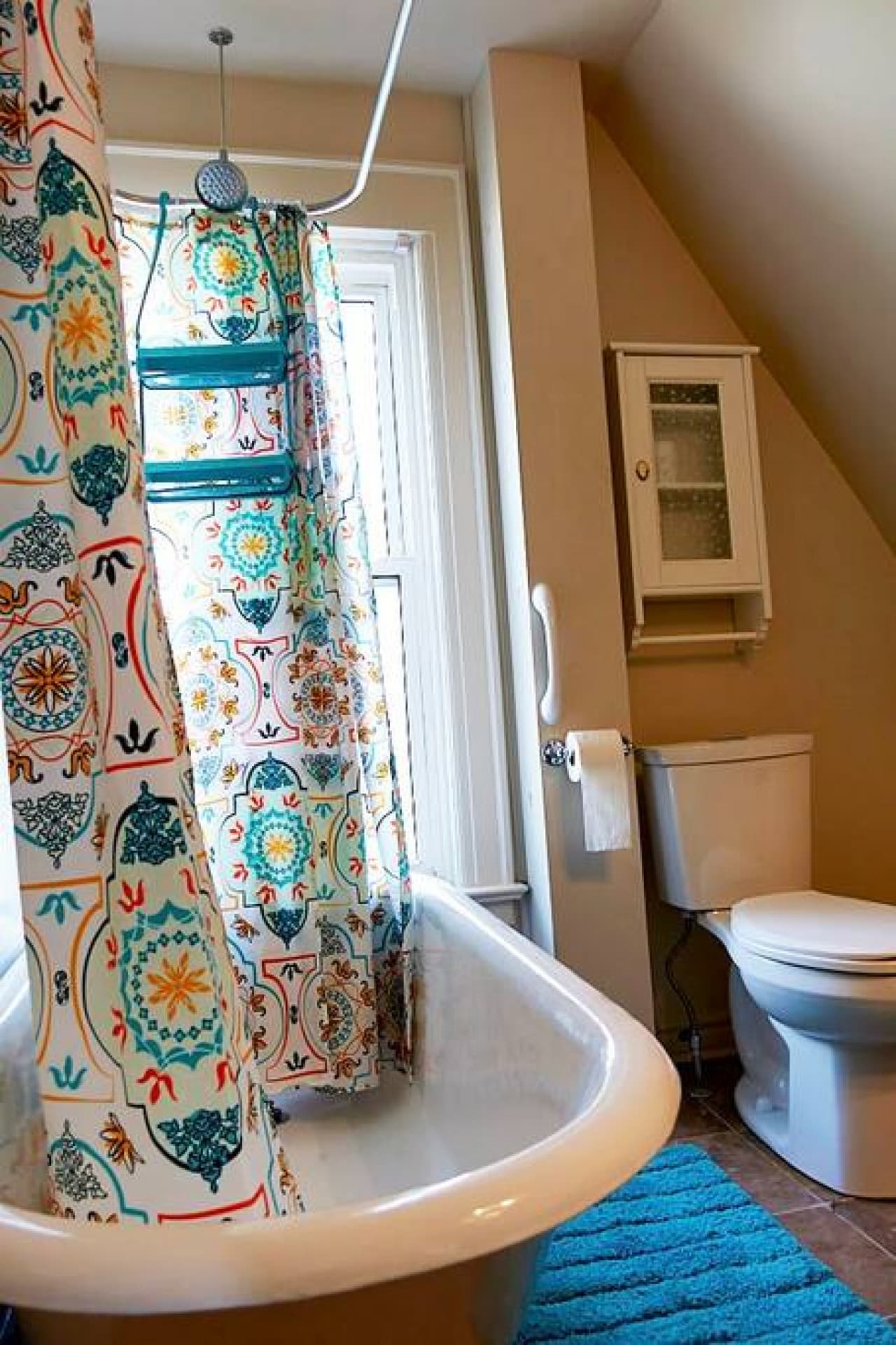Upstairs Bathroom with clawfoot tub and shower