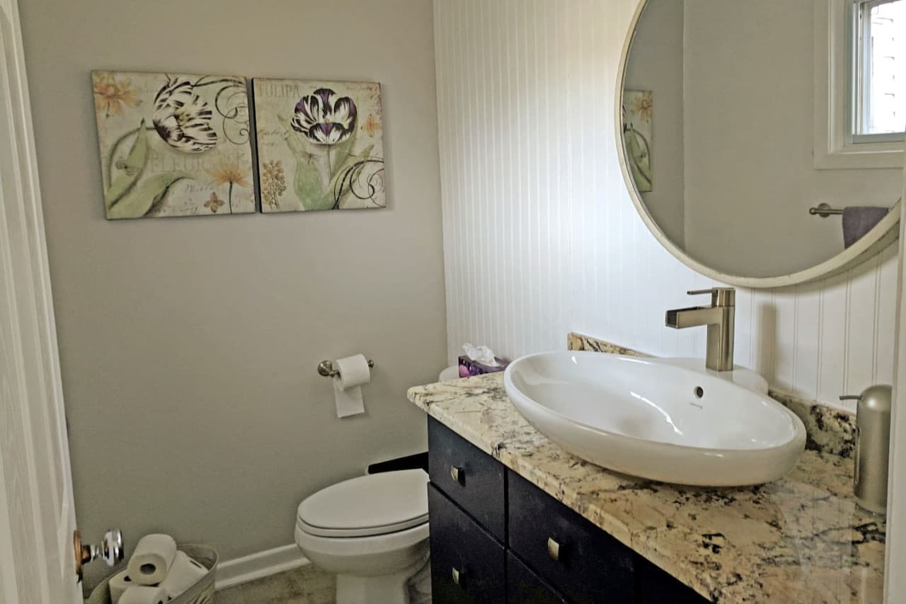 The two piece powder room is conveniently located on the main level.