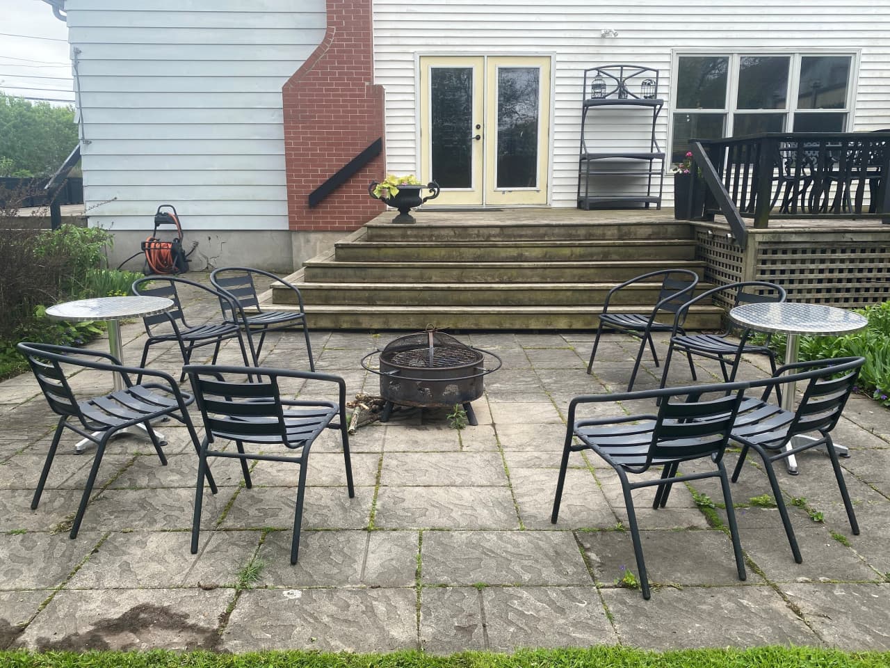 May 2025 firepit back of house.jpg