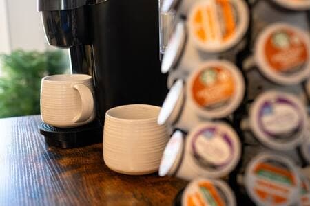 A Keurig and drip coffee maker, so pick your favorite option. Stocked with CloudSplitter Coffee.