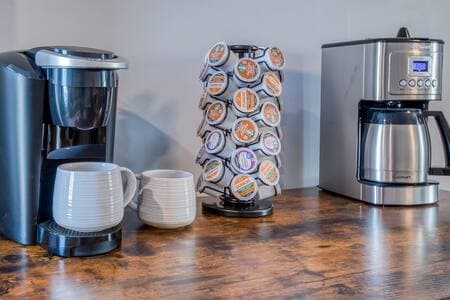 A Keurig and drip coffee maker, so pick your favorite option. Stocked with CloudSplitter Coffee.
