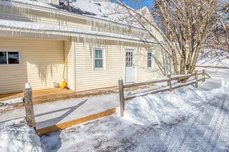 The entrance to the first floor space. And a large deck for warm weather enjoyment.