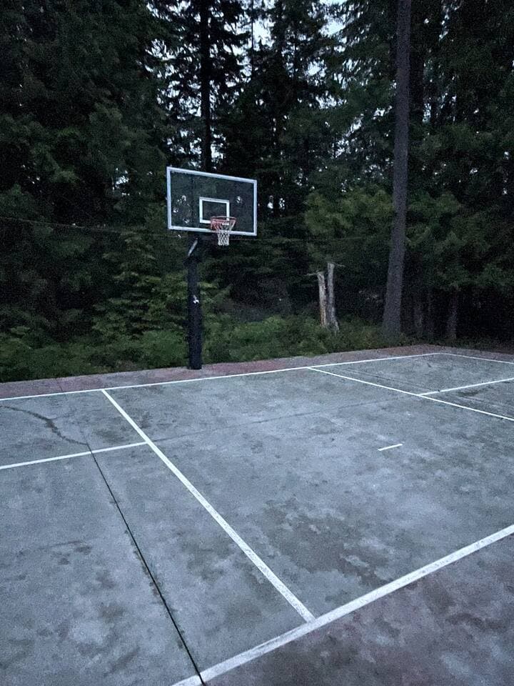 Regulation pickleball court, basketball and volleyball.  Racquets, balls, net available for use.   