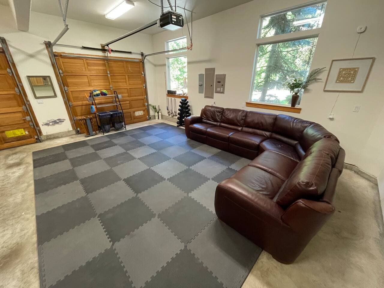 Garage is set up as an activity center. Equipment: Pickle-ball, Volleyball, Badminton, Corn Hole, Croquet, Karaoke, Poker Chips. 
Gym  equipment: Adjustable weight bench, Free weights, Bands, curl bar. 
65” Smart TV
