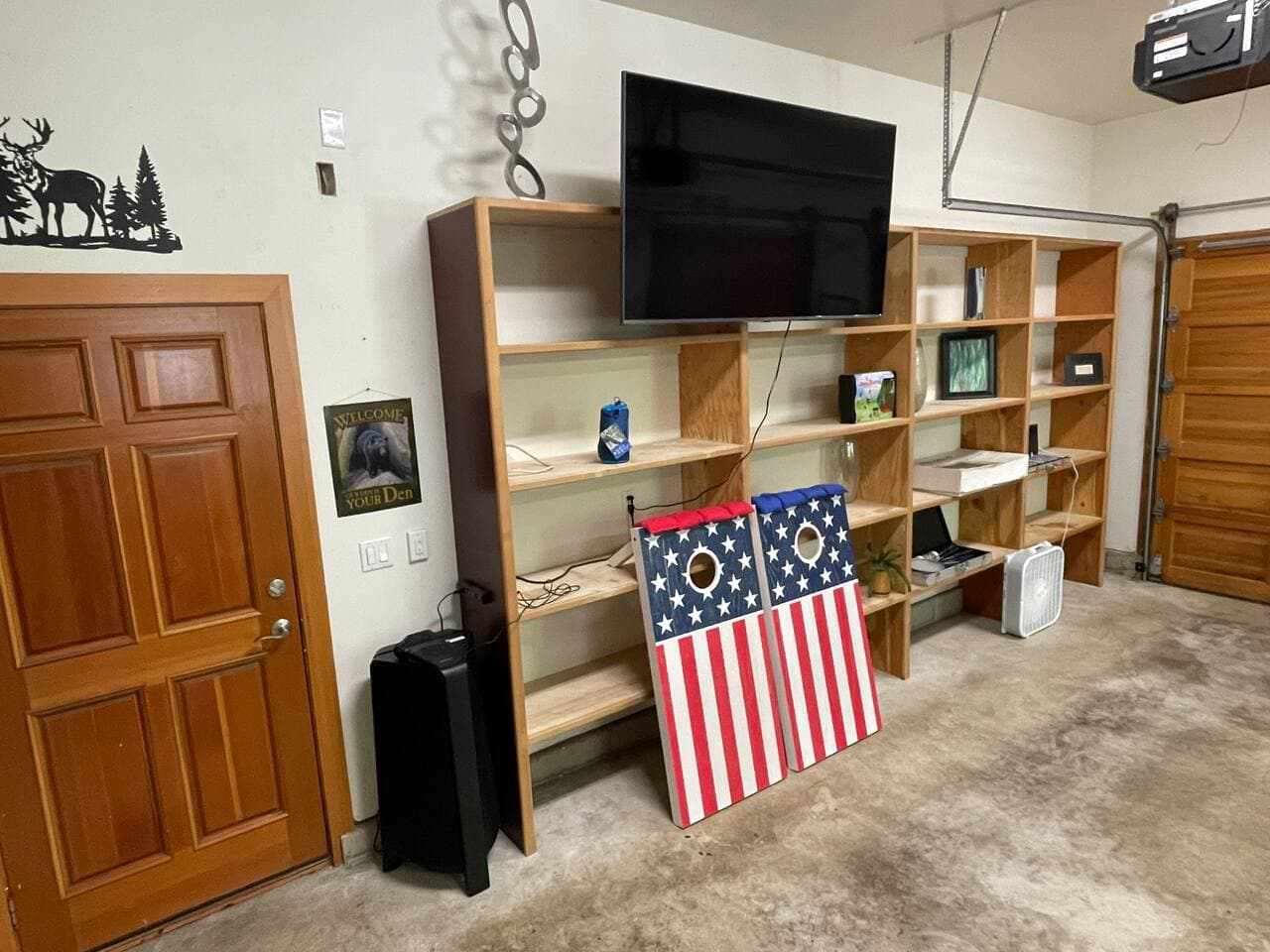 Garage is set up as an activity center. Equipment: Pickle-ball, Volleyball, Badminton, Corn Hole, Croquet, Karaoke, Poker Chips. 
VR Gaming with Oculus. 
Gym  equipment: Adjustable weight bench, Free weights, Bands, curl bar. 
65” Smart TV