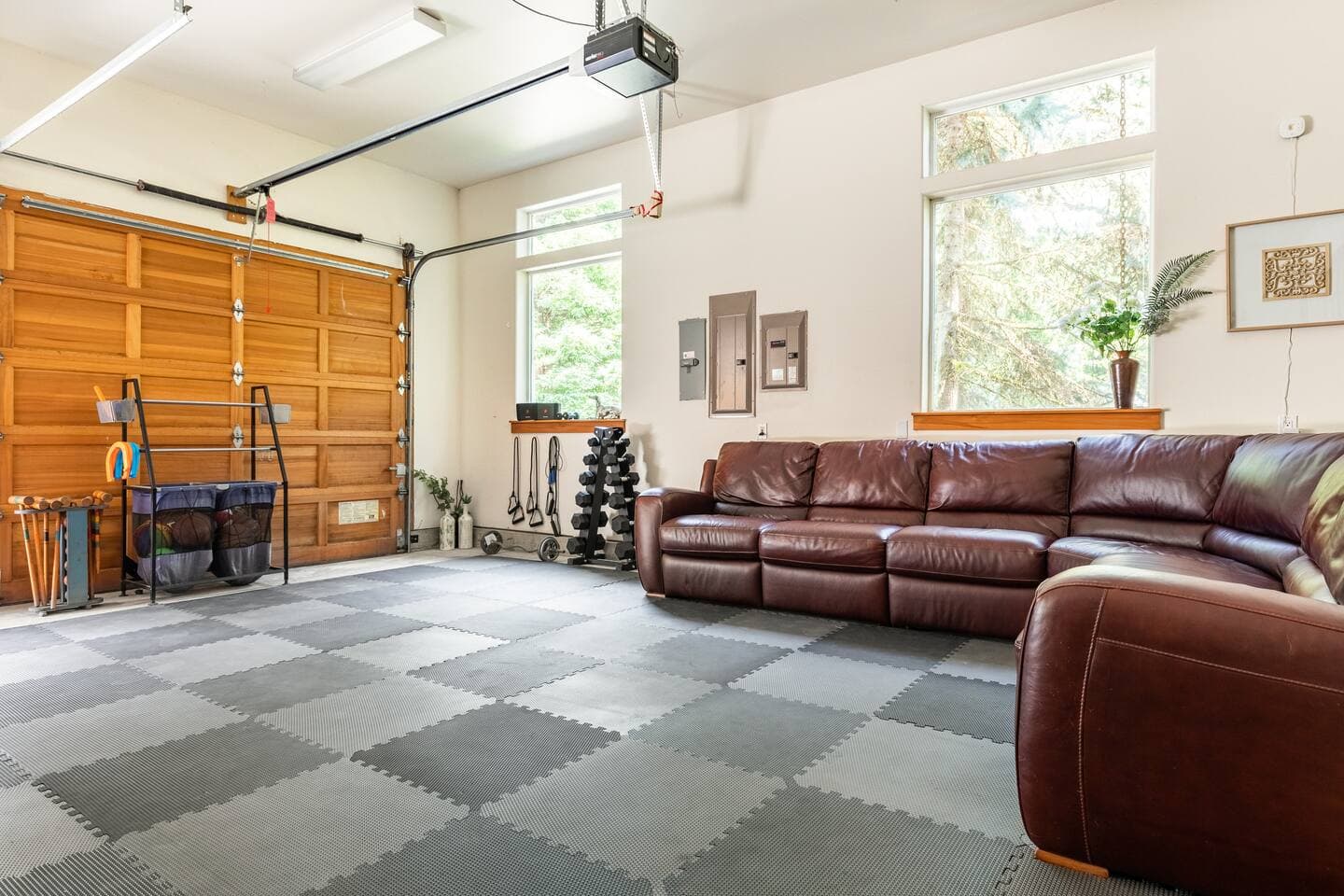 Yoga, weight bench workout area with TV, cushioned floor tiles