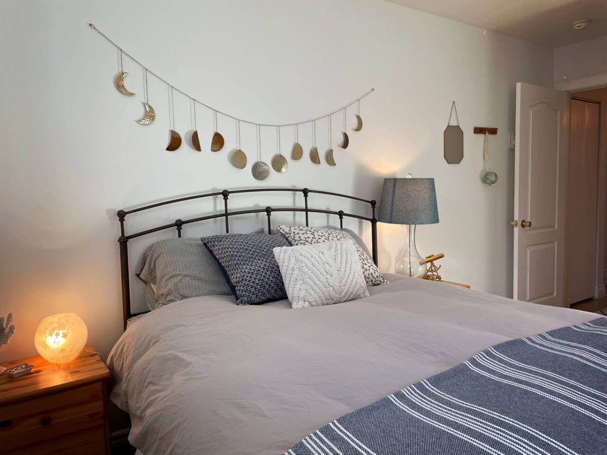 The Blue bedroom has a slight 'nautical feel',  has one queen sized bed, a large wardrobe and in the warm months, a window air conditioner. Both of the two bedrooms are the same size.