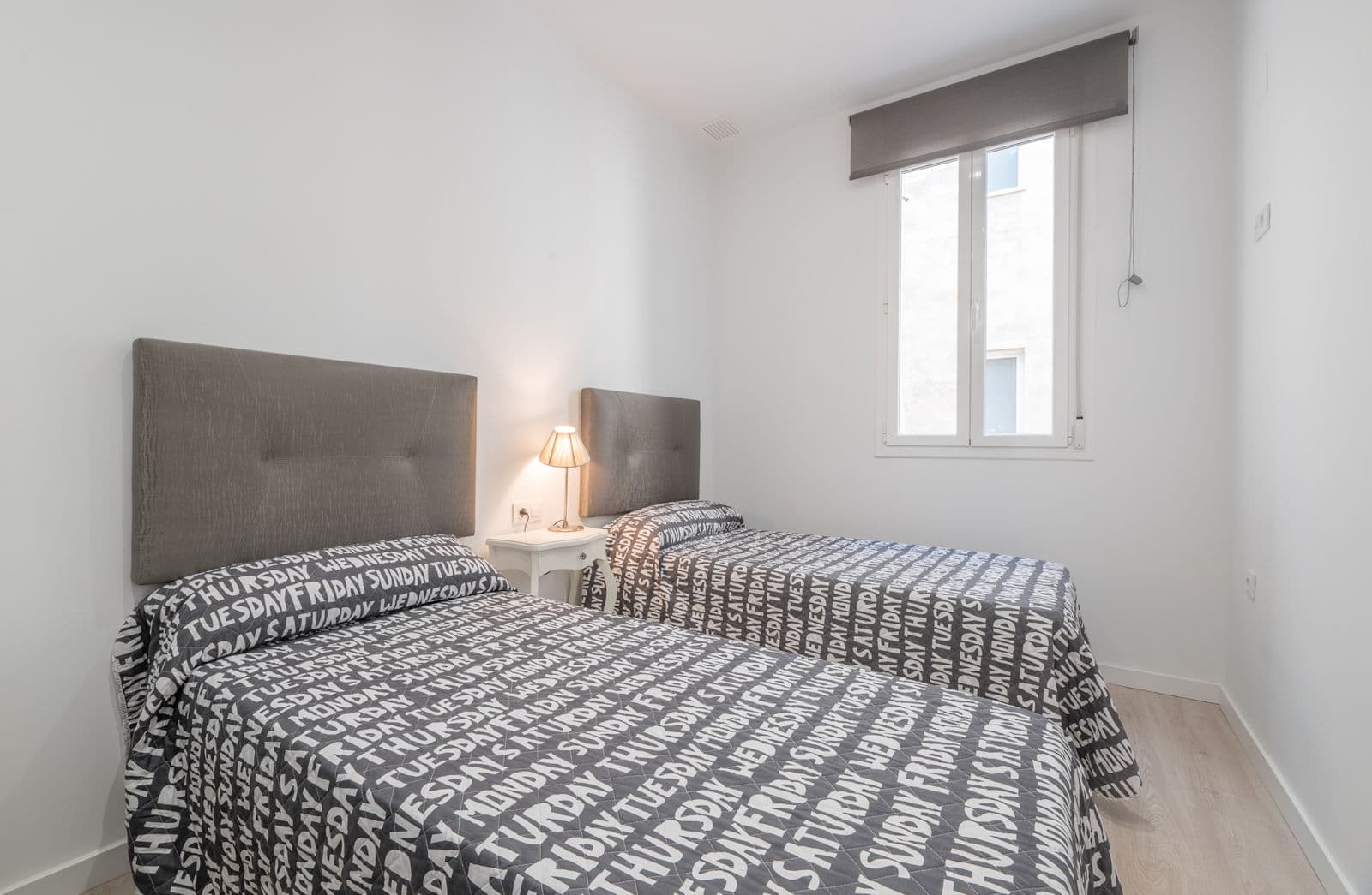 Bedroom 2 with 2 single beds