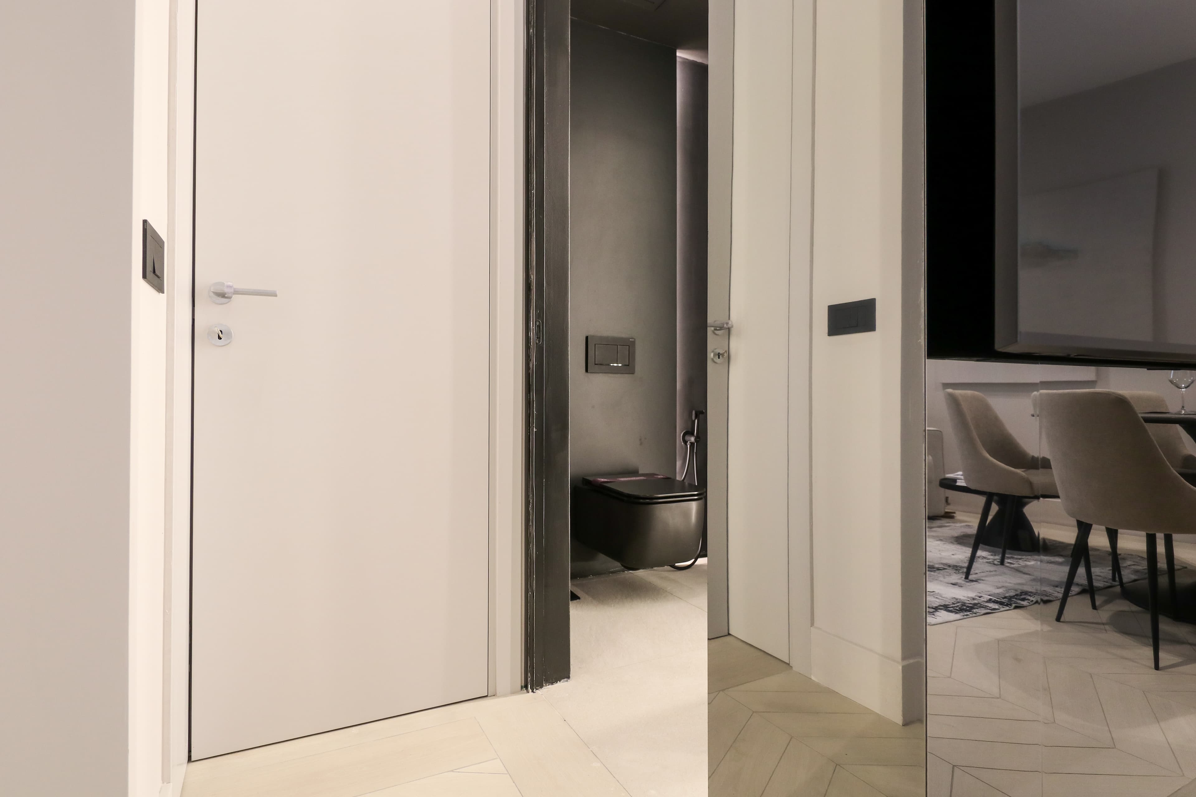 Half-Bathroom and Laundry Area neatly tucked away