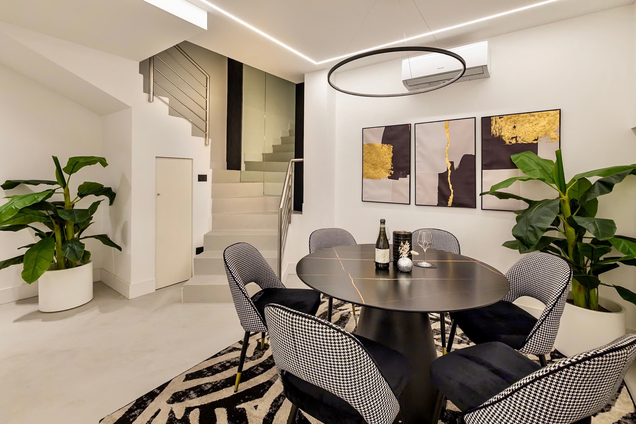 Dining area adorned with art and plants