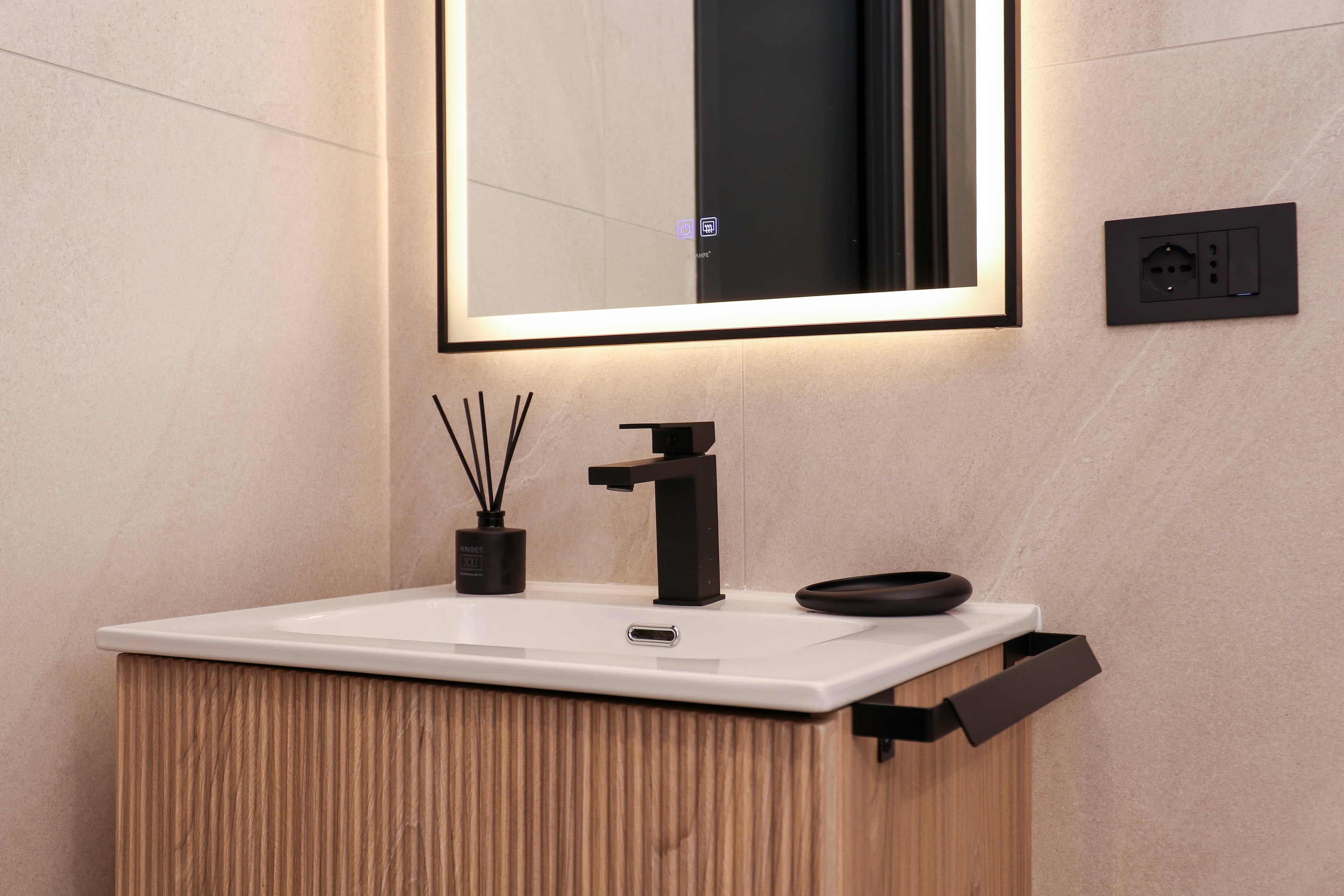 Modern finishes and a light-up mirror, perfect for getting ready