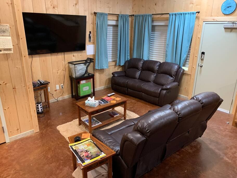 Lake Godstone Lodge Den with widescreen TV.