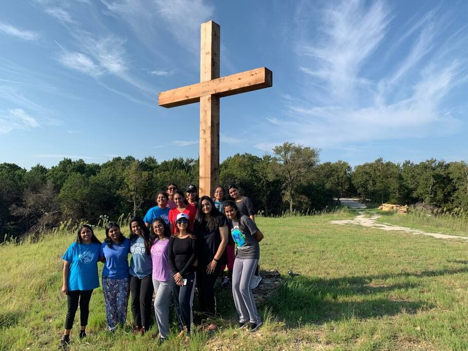 Texas Church Retreat TCross at the top of the dam at Lake Godstone