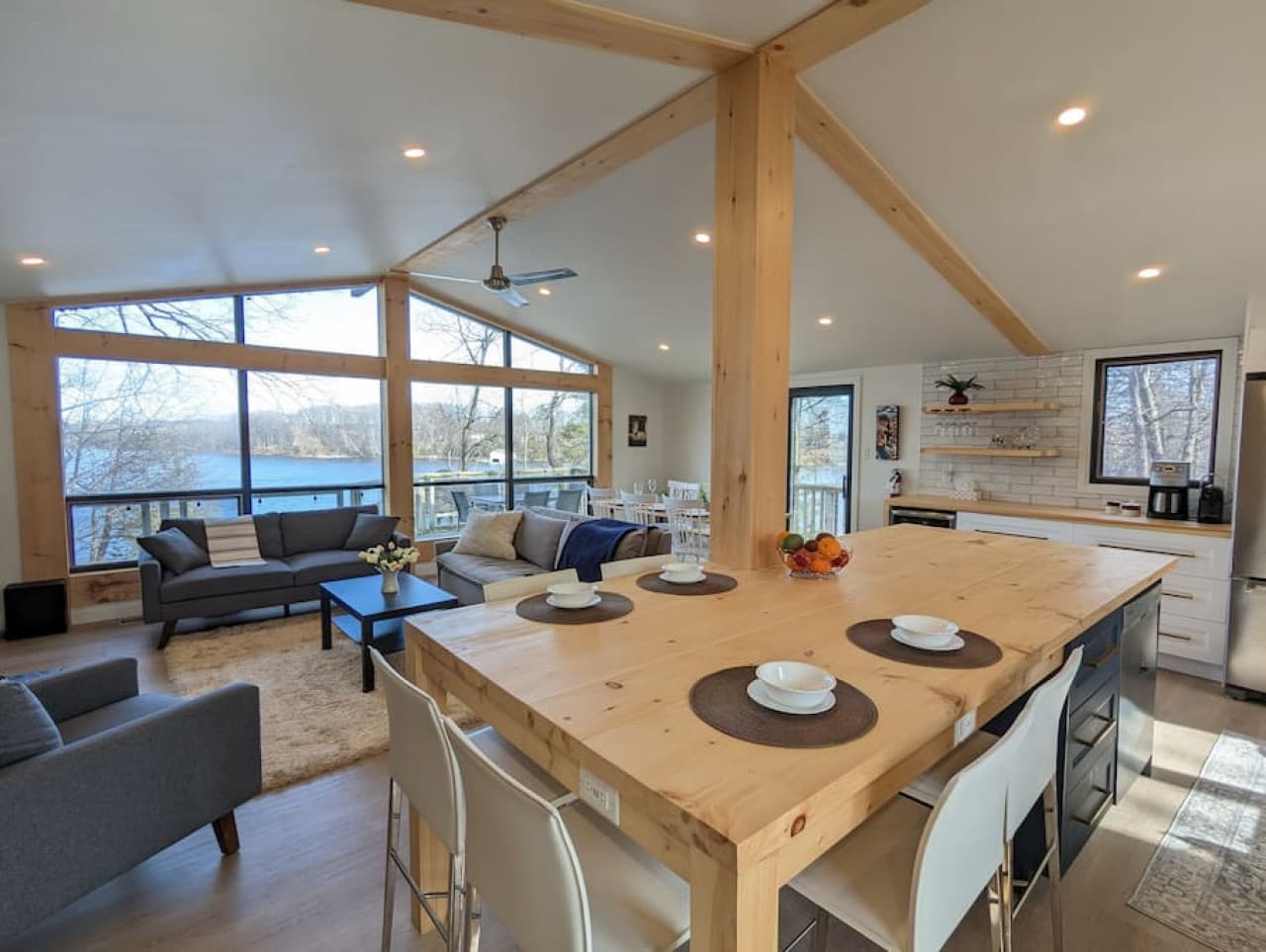 Open concept space and large island with charging ports to work or enjoy a meal