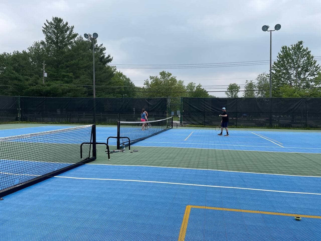 2 Tennis rackets and 2 balls available for use