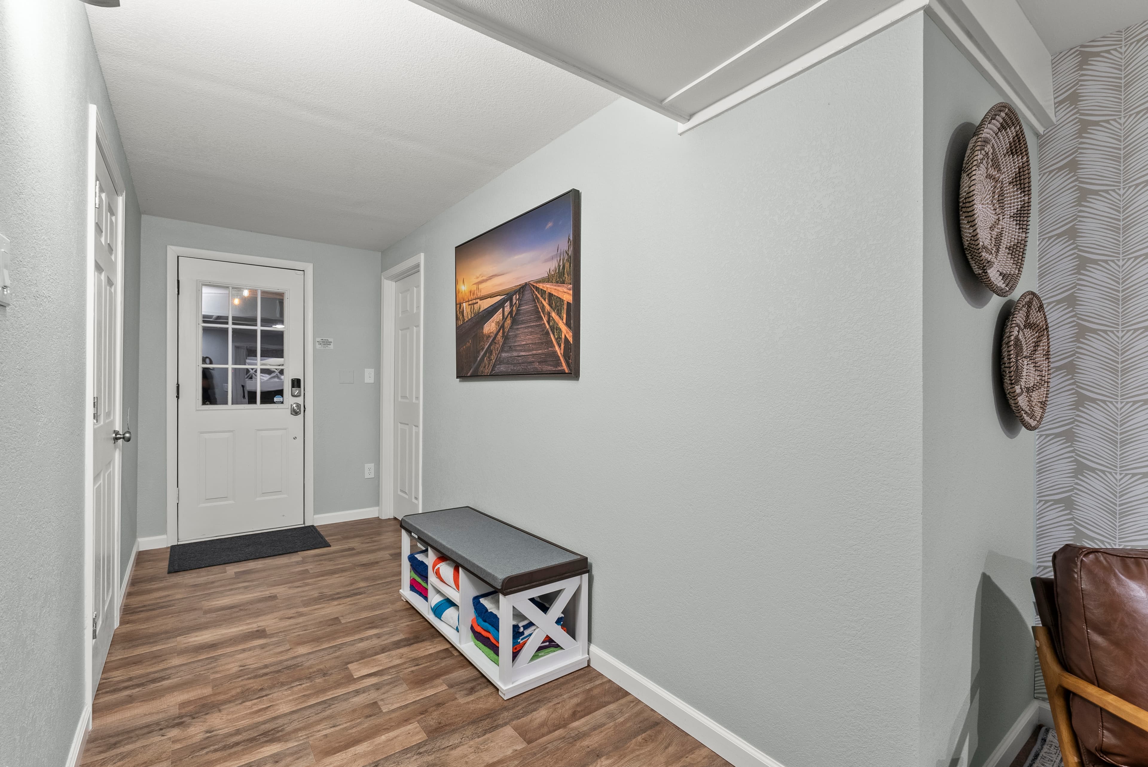 Hallway lower level gives access to laundry, bathroom,bedroom,gameroom & hot tub. Spa towels 