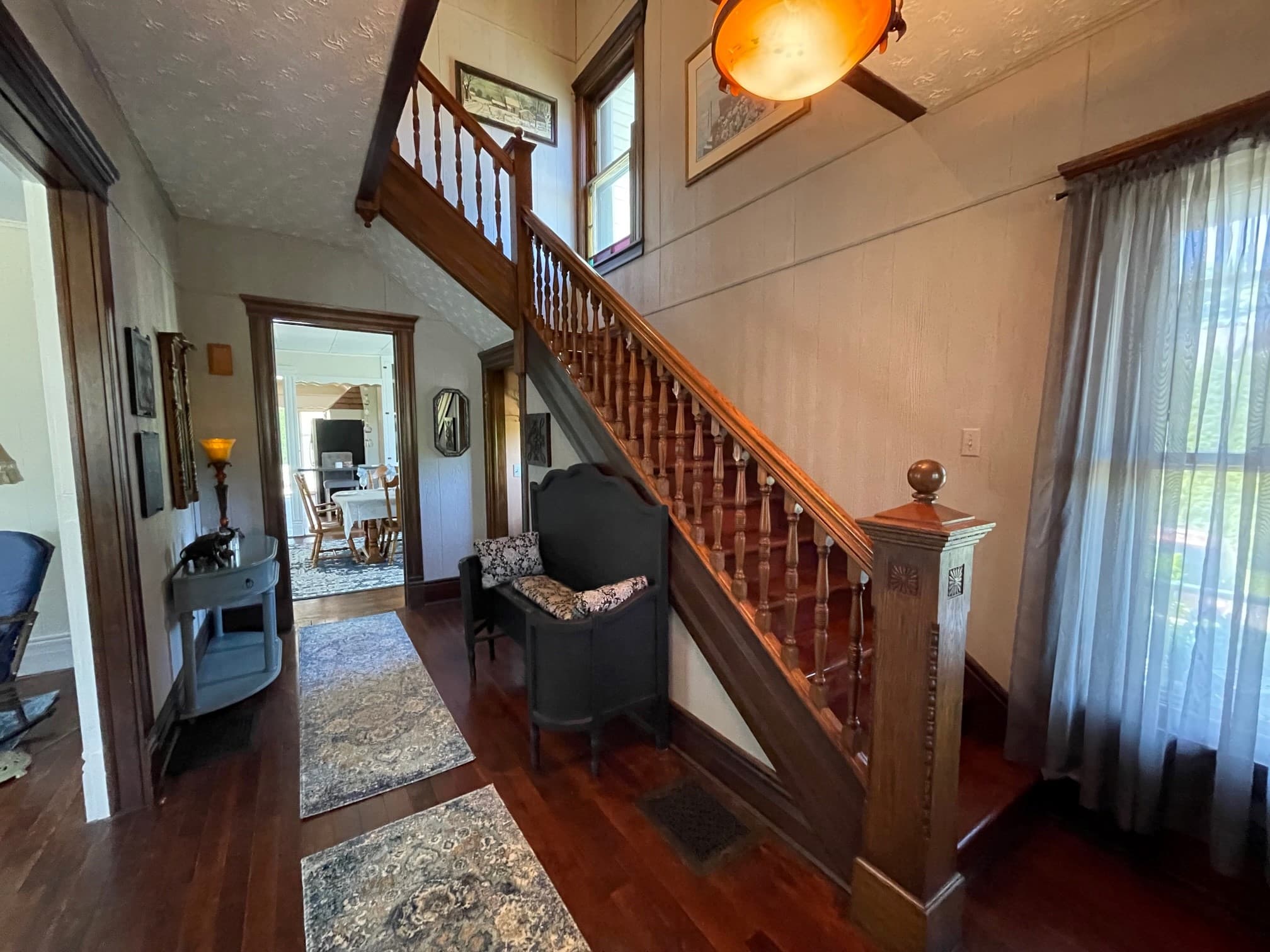 Main Street - front hallway - from front door towards stairs and dining room