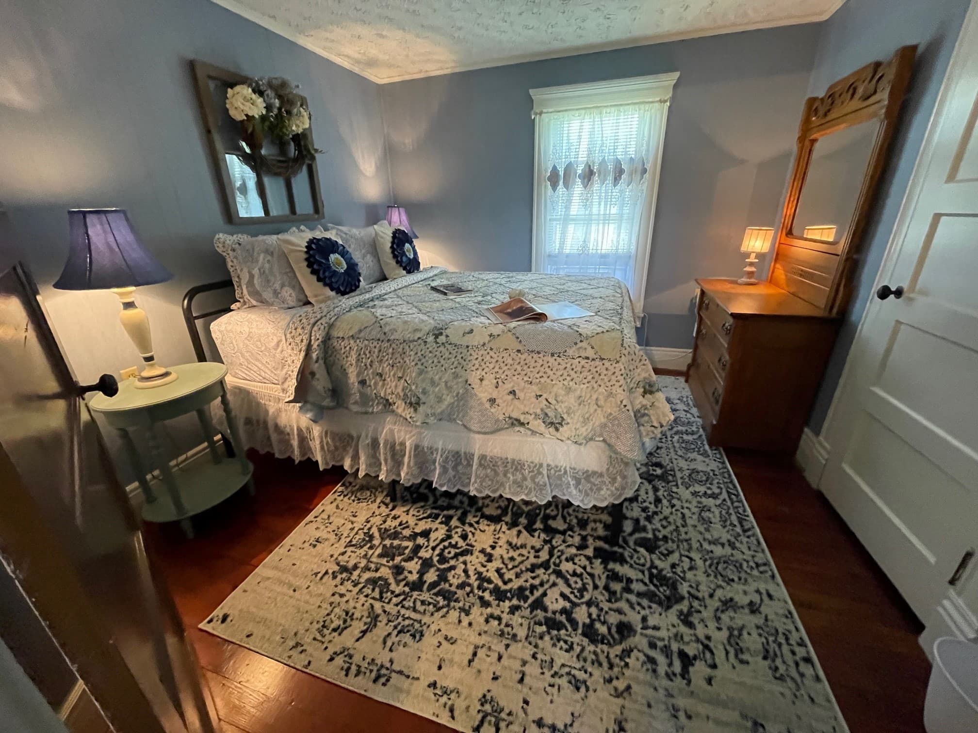 Main Street - Bedroom w Mirror on Dresser - Towards Windows