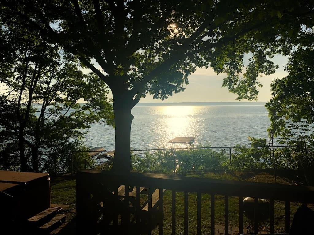 Sunrise glistening off lake