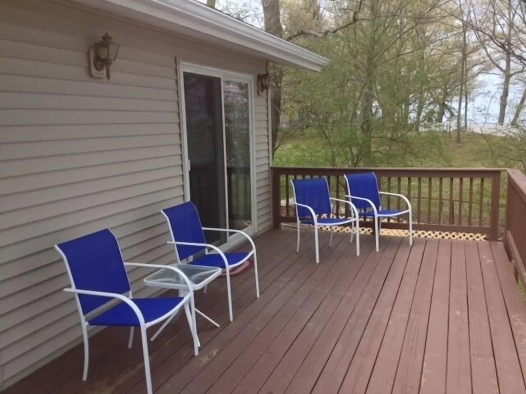 Chairs on deck facing the lake