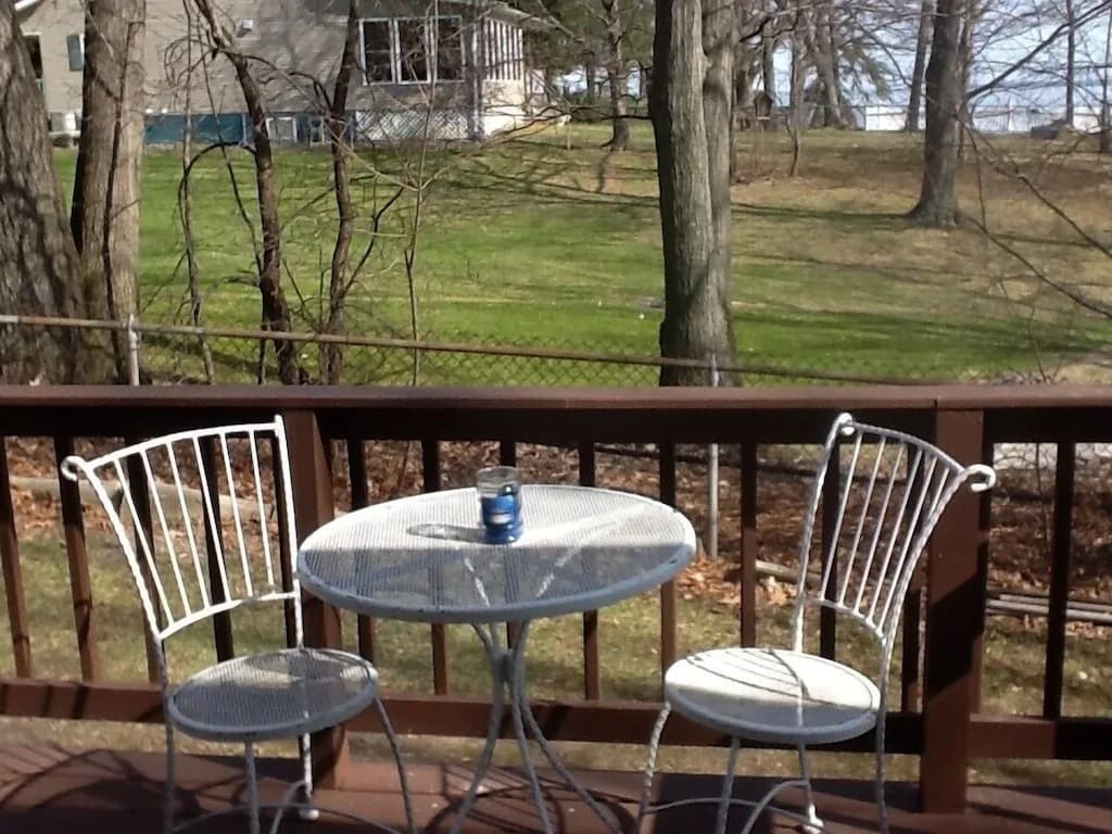 Side entry deck with bistro table and chairs