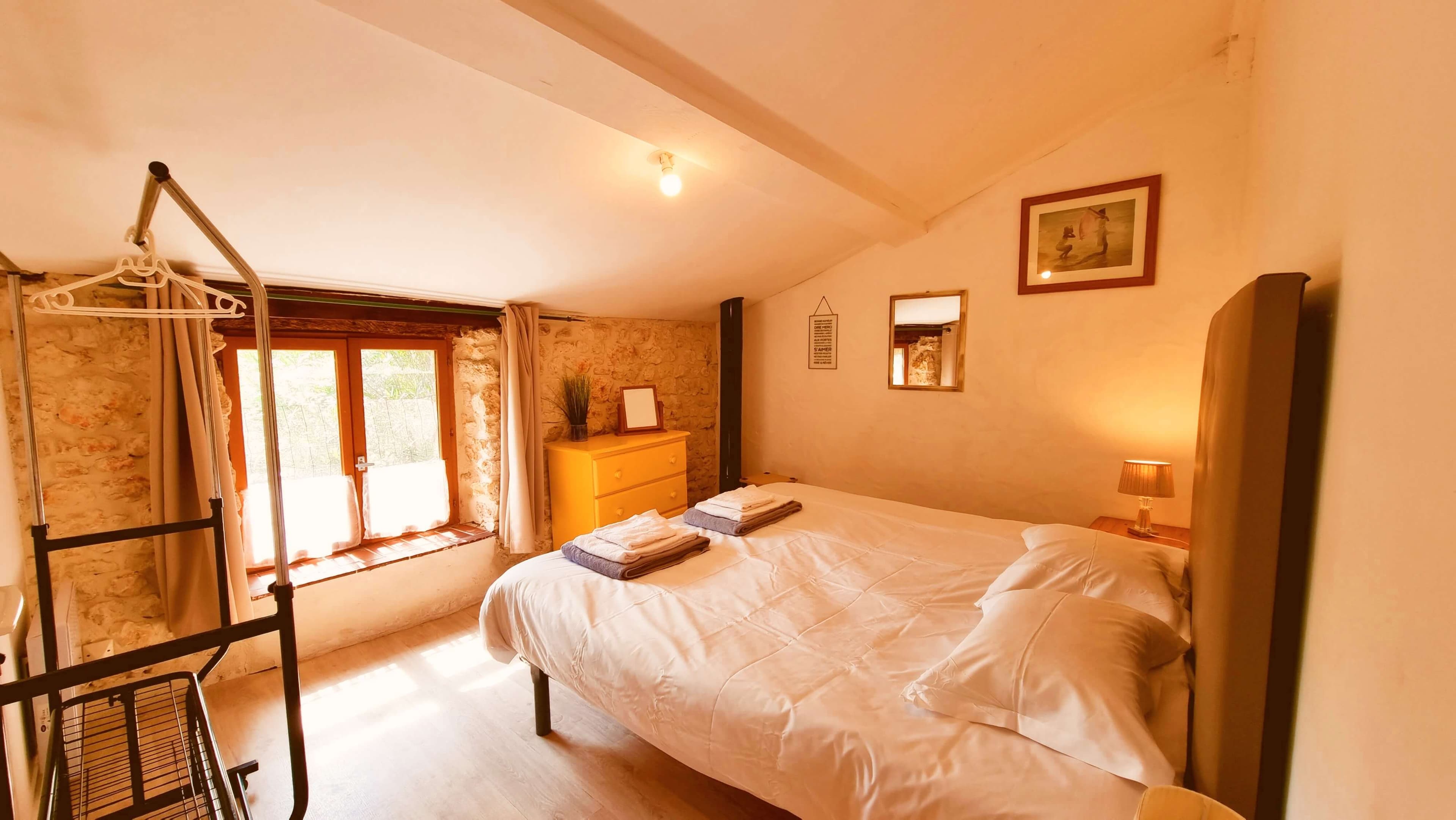 Comfortable double bedroom with warm tones