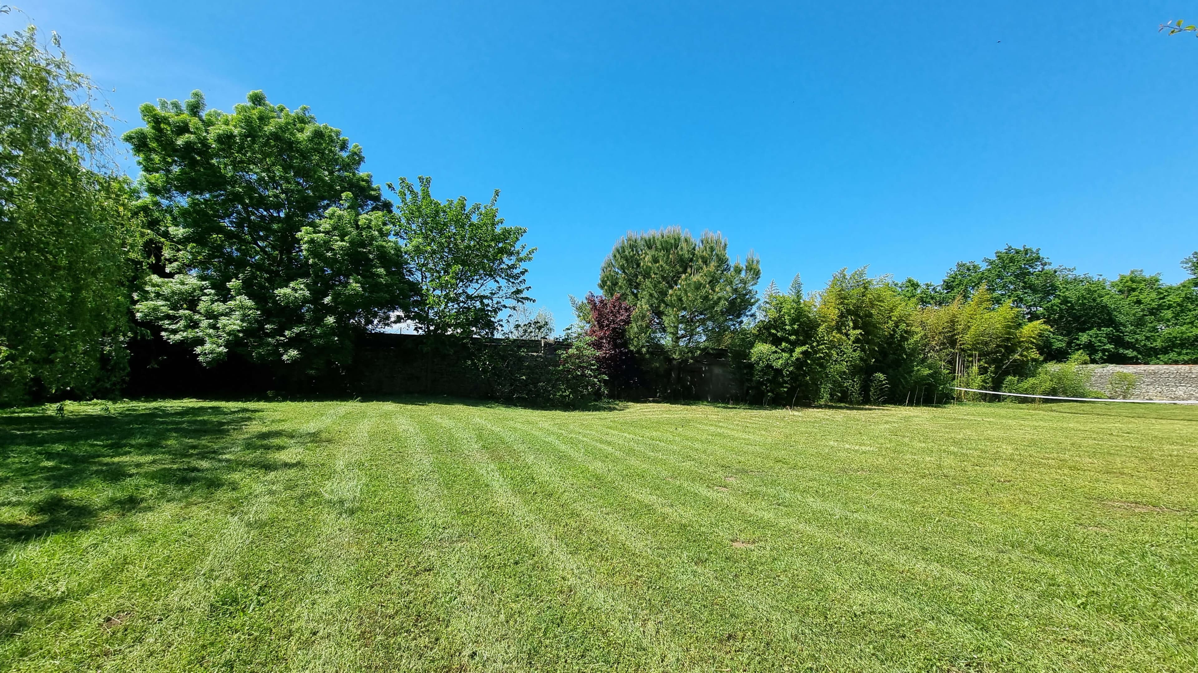 Large lawn ideal for games and relaxation