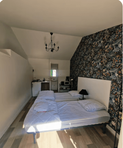 Bright bedroom with double bed and garden view