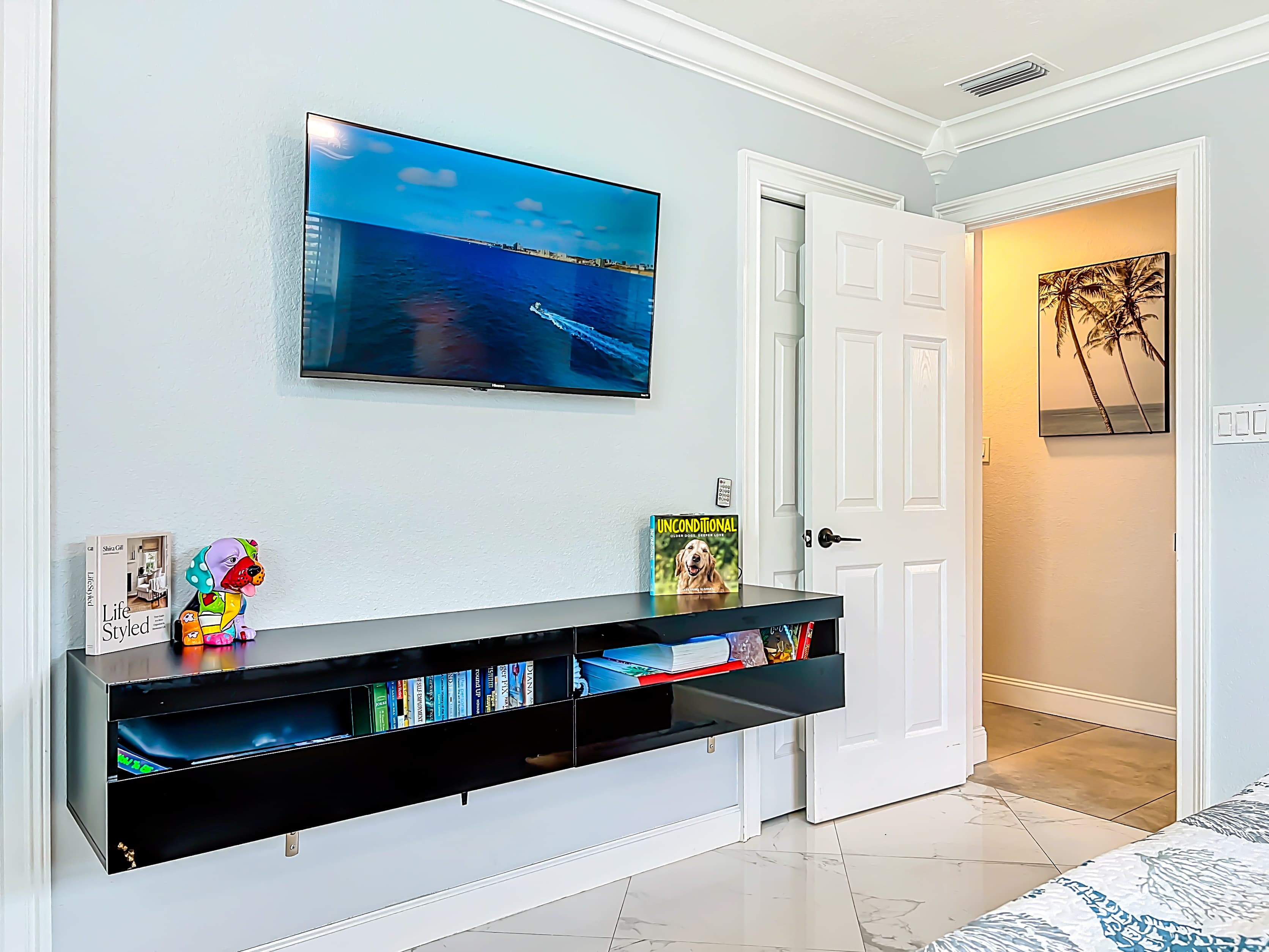 Floating book shelf with TV 