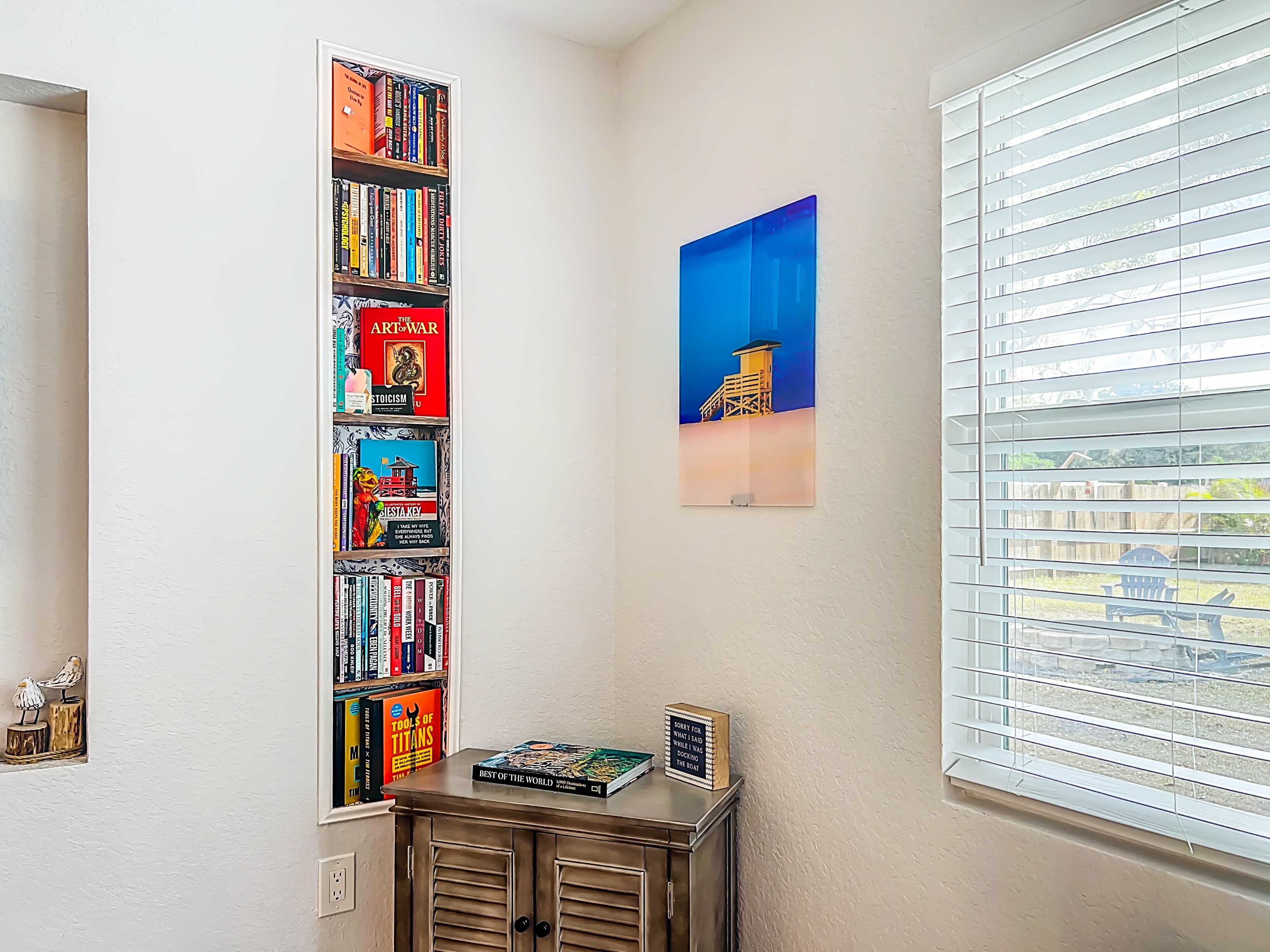 Built in book shelf with several genres