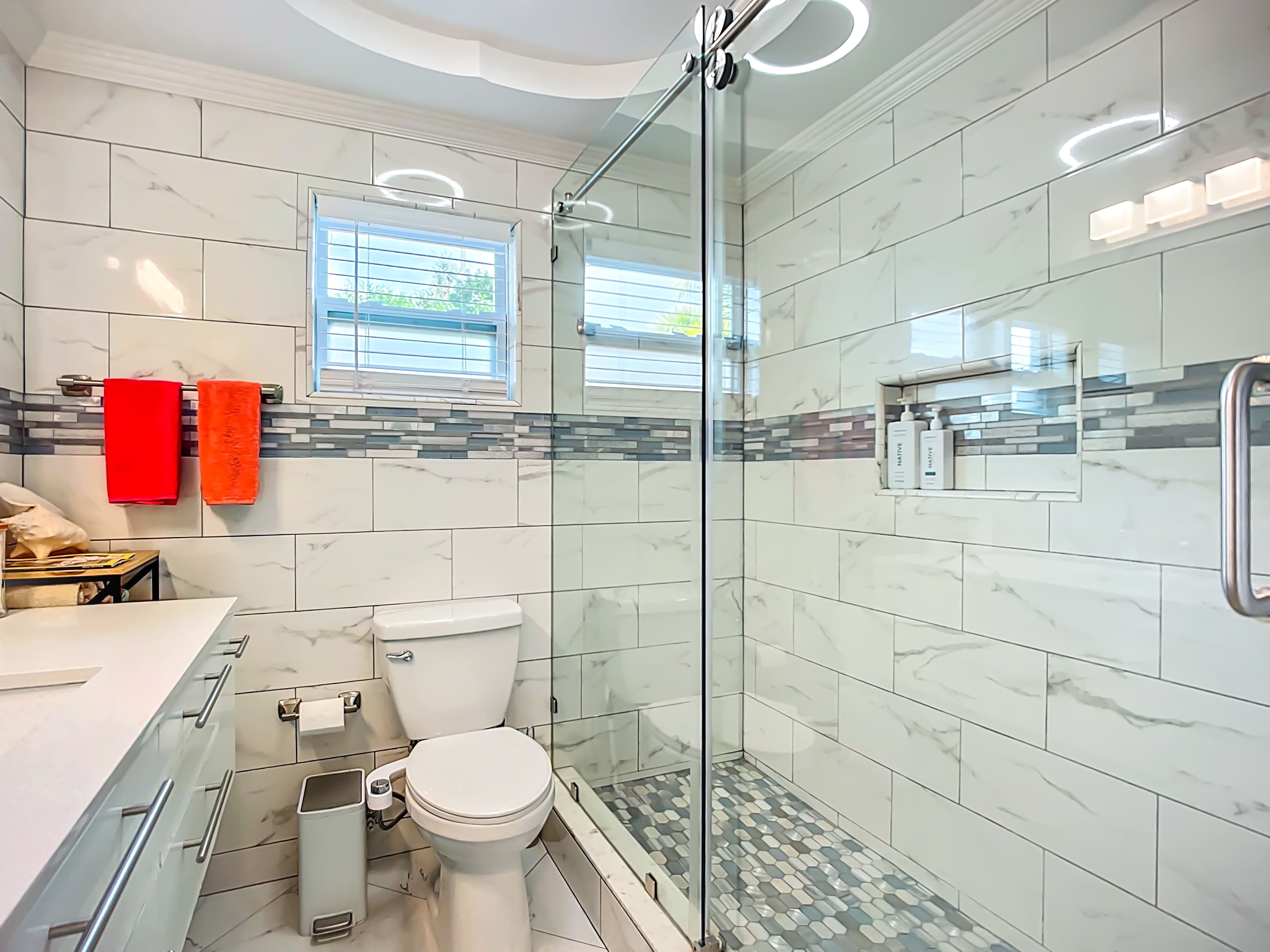 Bidet attachment and oversized shower 