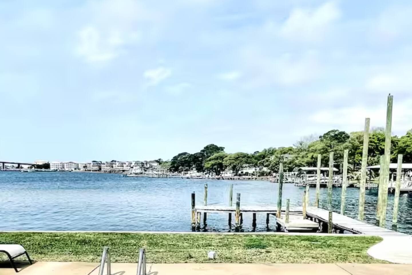 DEEP,  PROTECTED WATER WITH A PRIVATE DOCK, IDEAL FOR BOATS AND WAVERUNNERS. ENJOY ALL YOUR WATERFRONT ADVENTURES!!