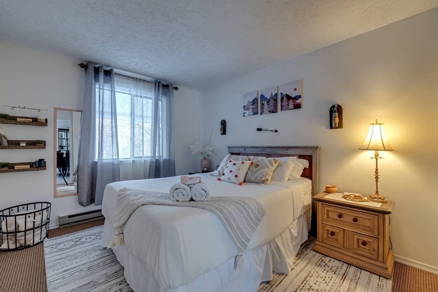 Conveniently located on the first floor, this cozy queen bedroom features a comfortable queen bed, o