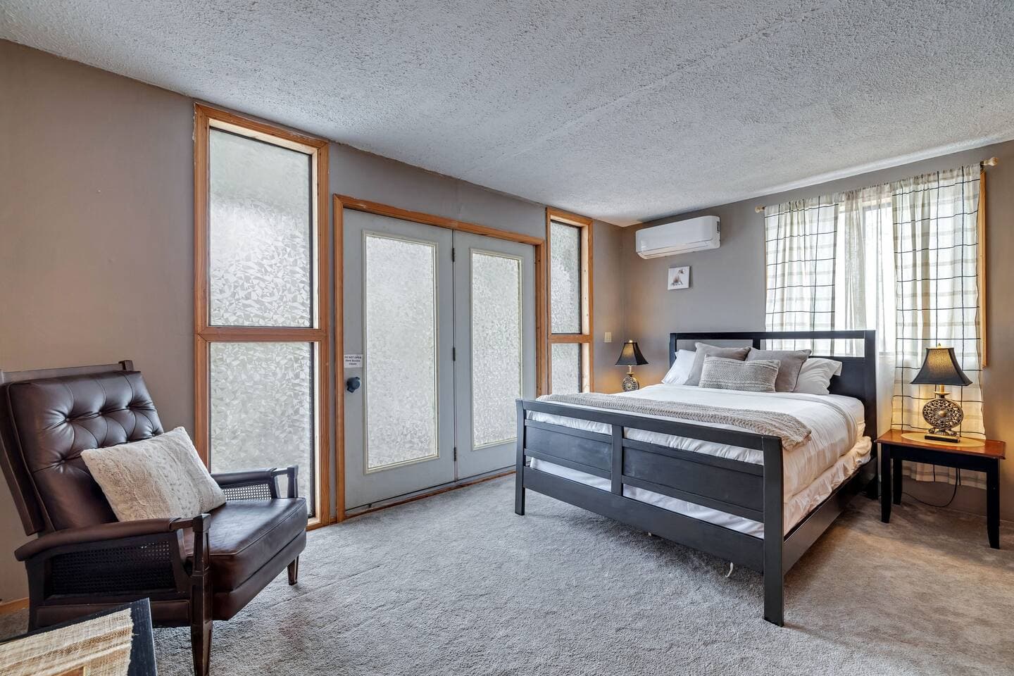Cozy queen bedroom with a comfortable queen bed, perfect for a restful night's sleep. Thoughtfully d