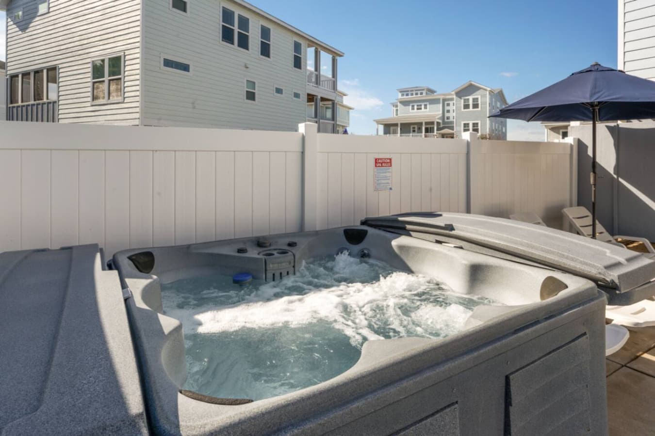 Private hot tub courtyard for unwinding after a full day in the sun
