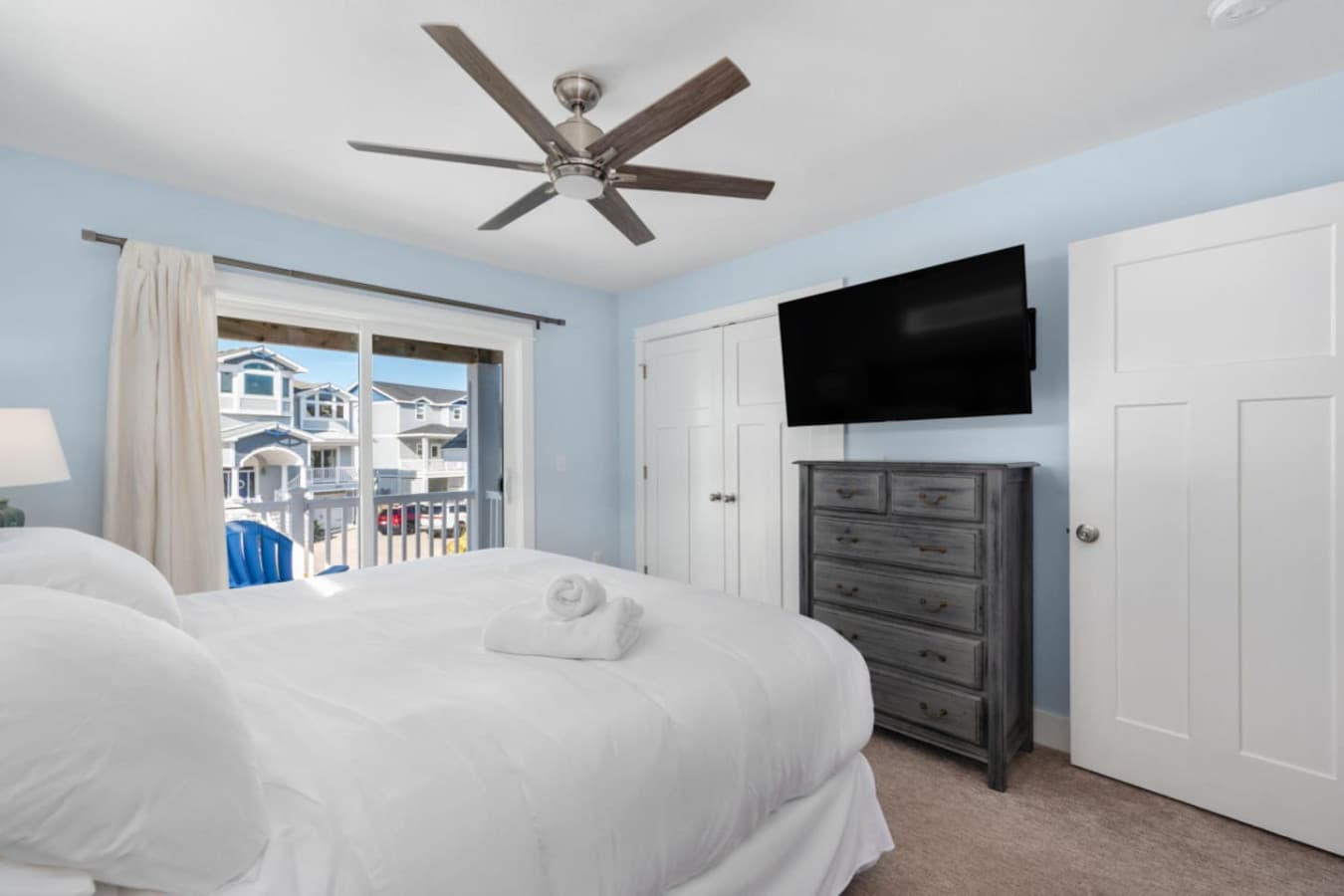 Cozy retreat w/ dresser storage, TV & sunshine streaming through the windows