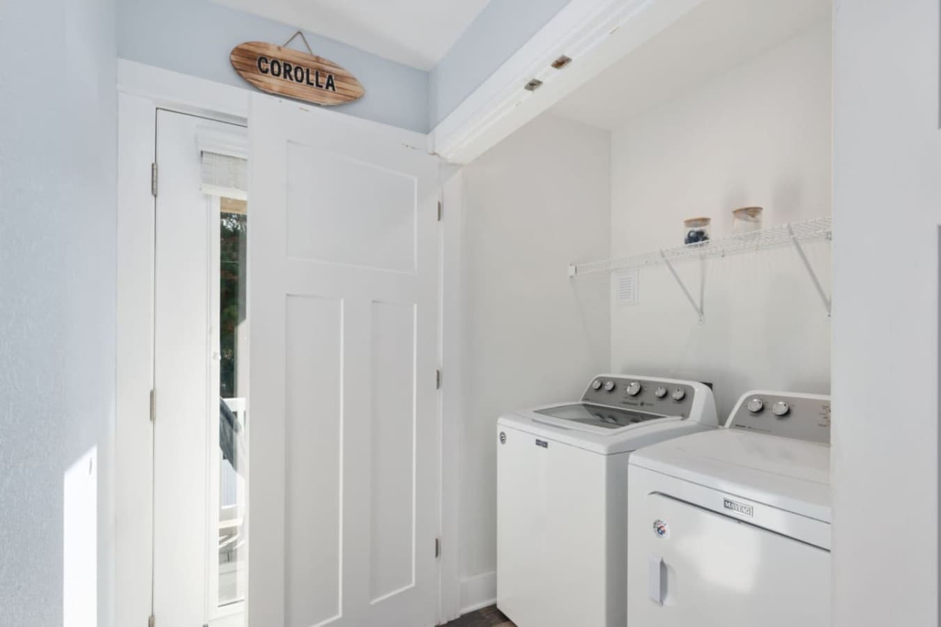Clean laundry area w/ washer & dryer for added convenience