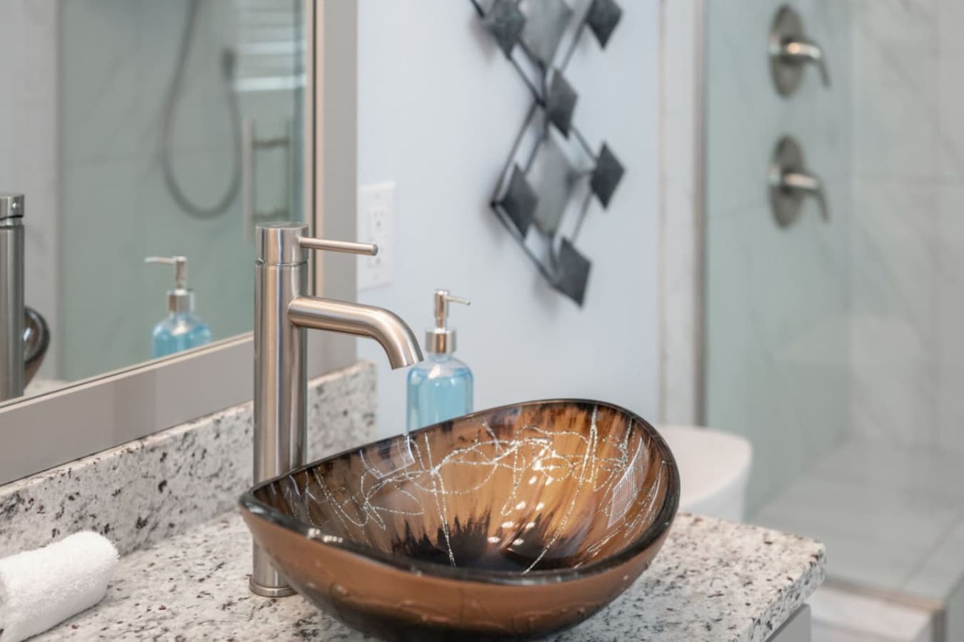 Stylish bathroom vanity w/ vessel sink & modern fixtures