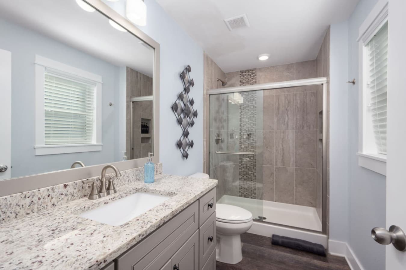 Walk-in shower w/ tile surround & a clean, spa-like feel