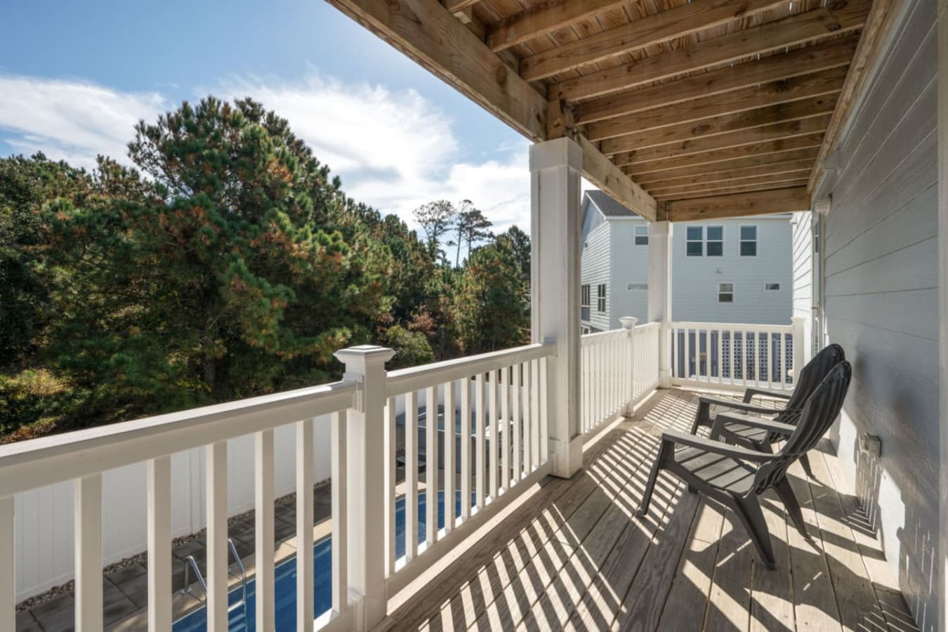 Shaded balcony nestled in the trees, perfect for quiet moments outside