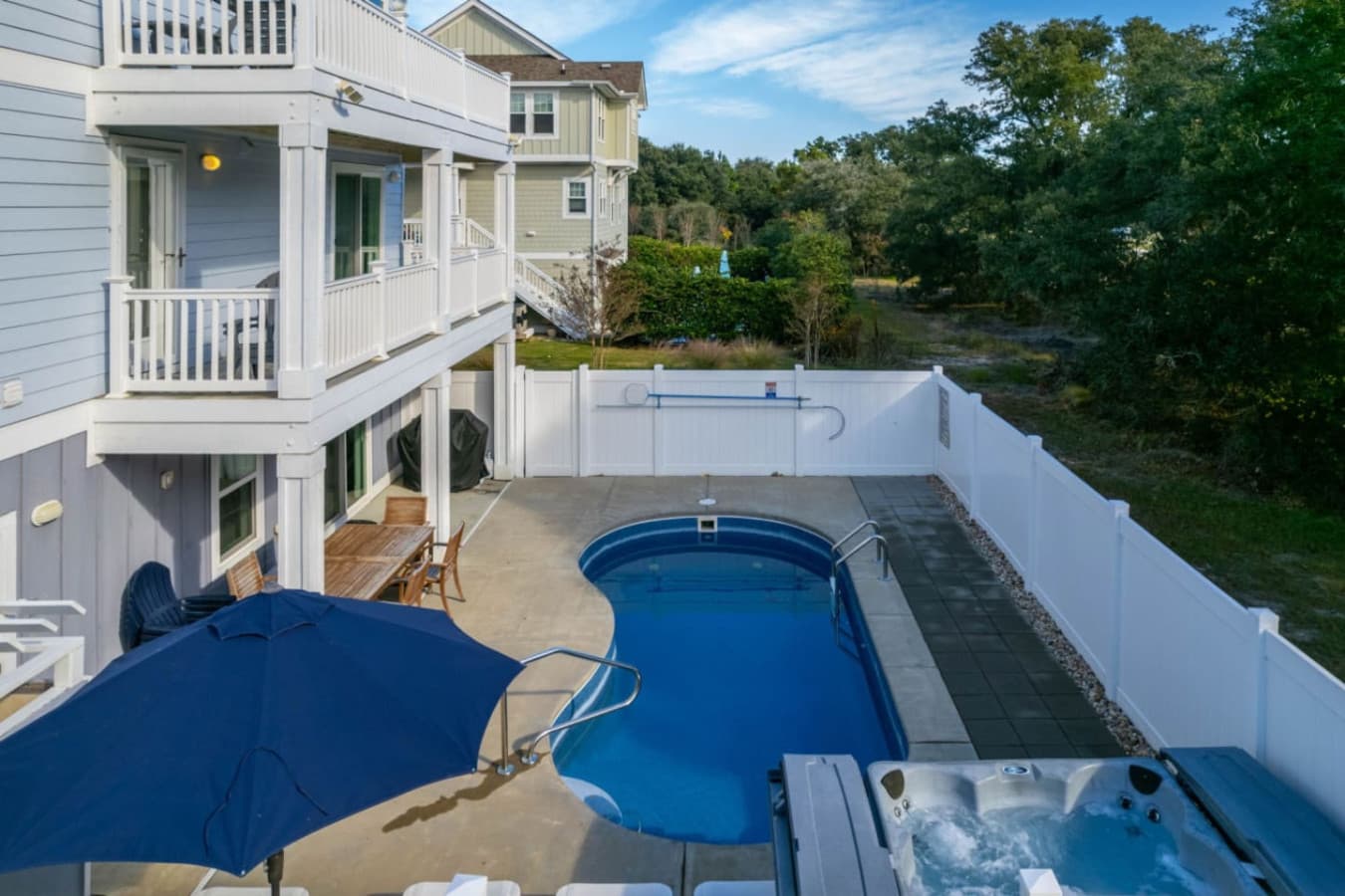 Elevated view of the pool deck w/ room to lounge & cool off