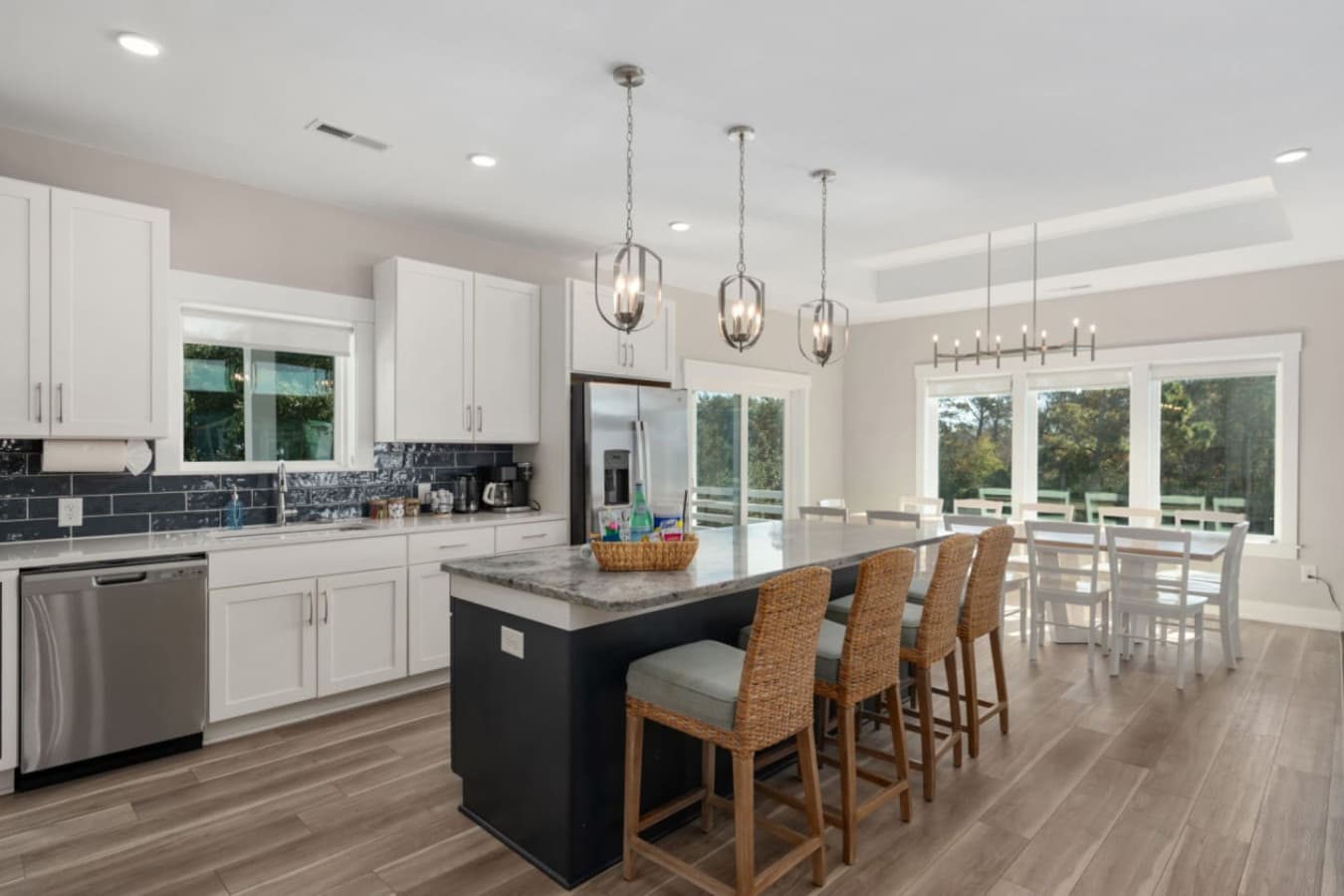Large kitchen & dining setup w/ plenty of seating for shared meals.