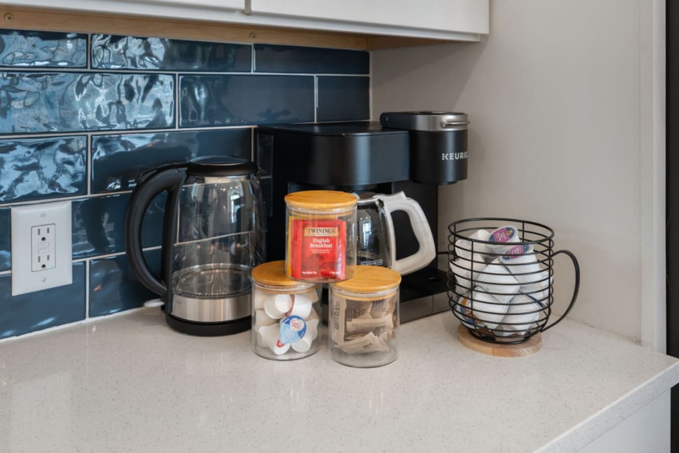 In-room coffee station w/ essentials ready for easy mornings & late-night sips.