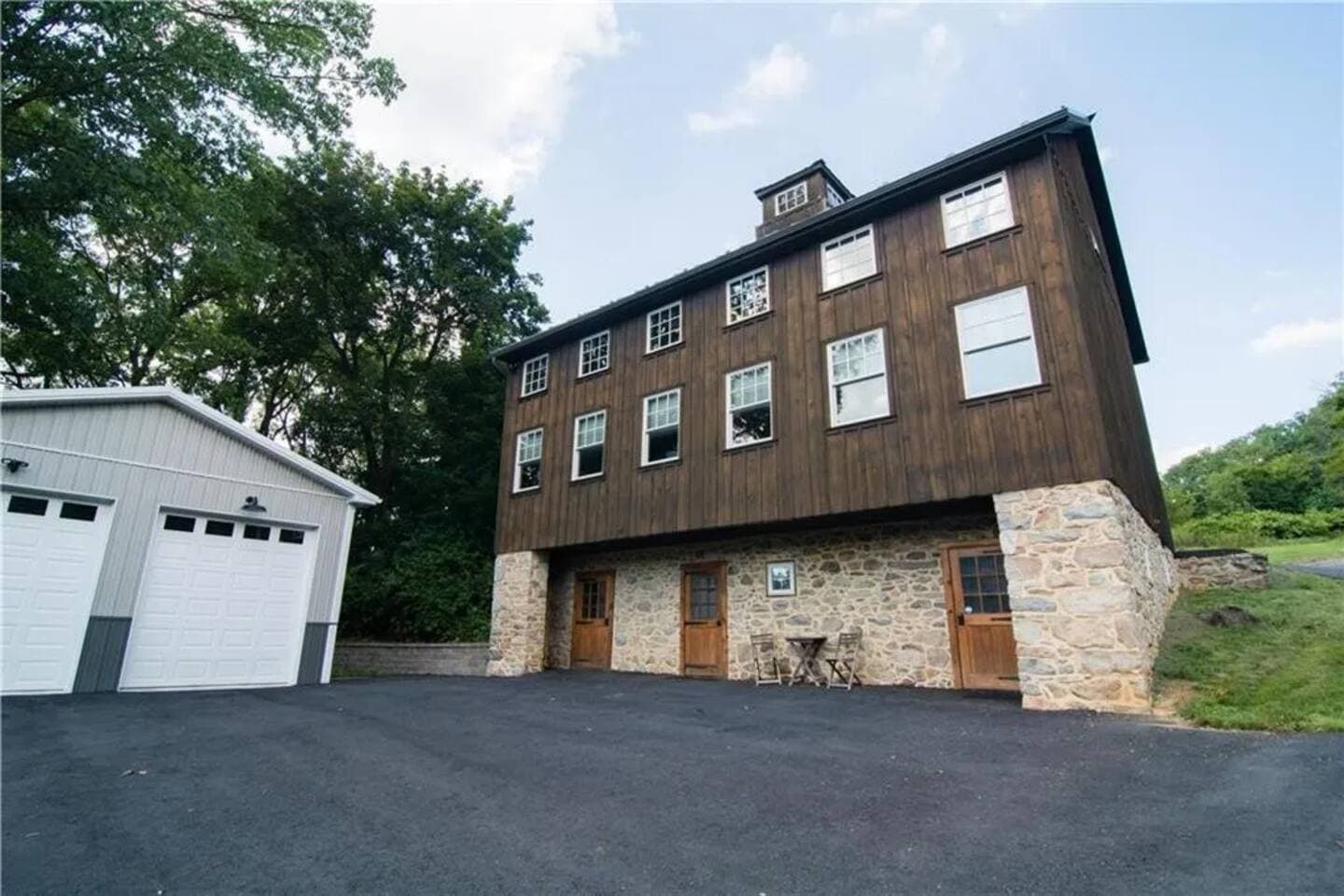 Below in s a separate building is the playroom.