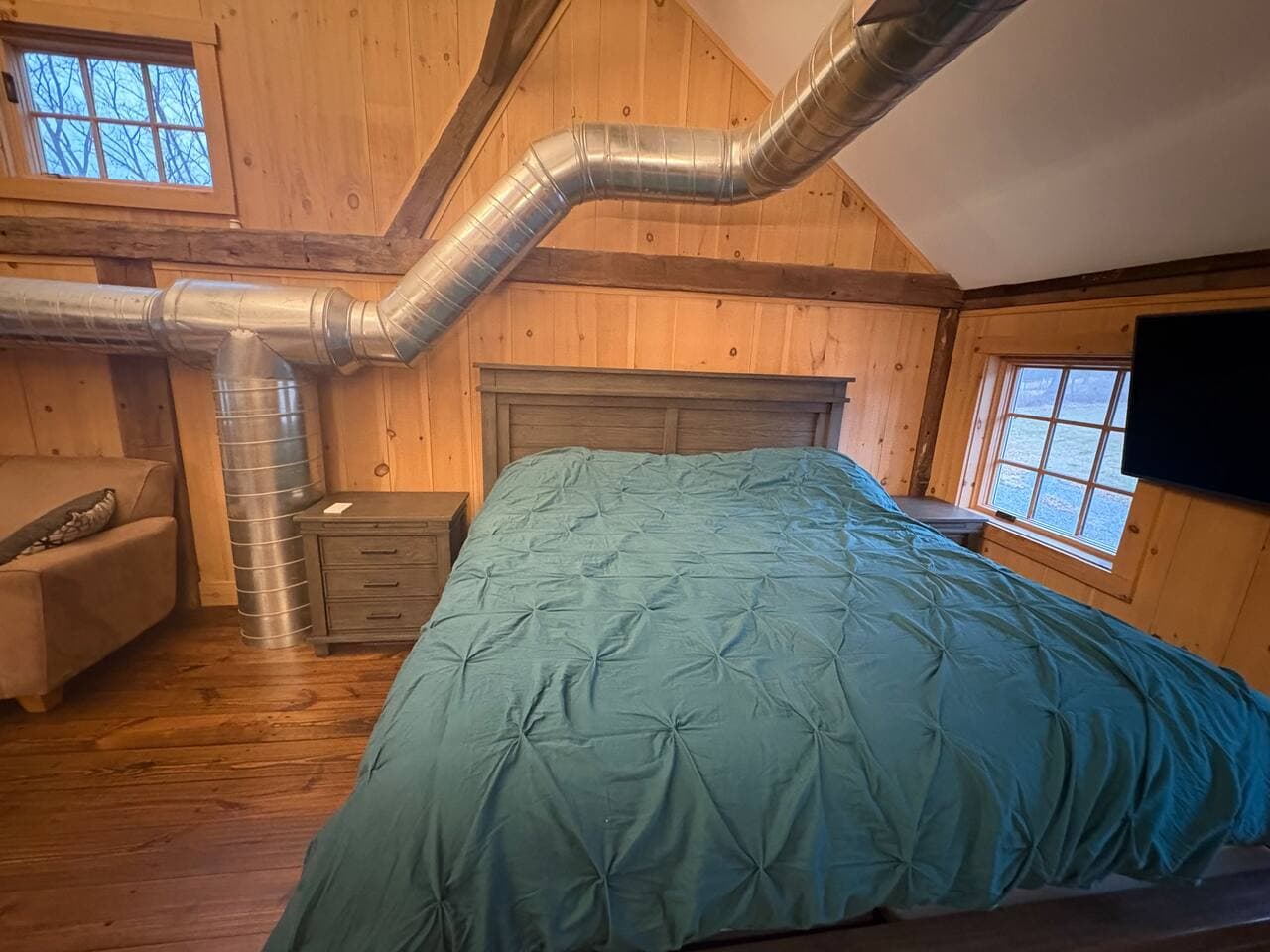 King bed overlooking the entire barn.   I view you will never forget.