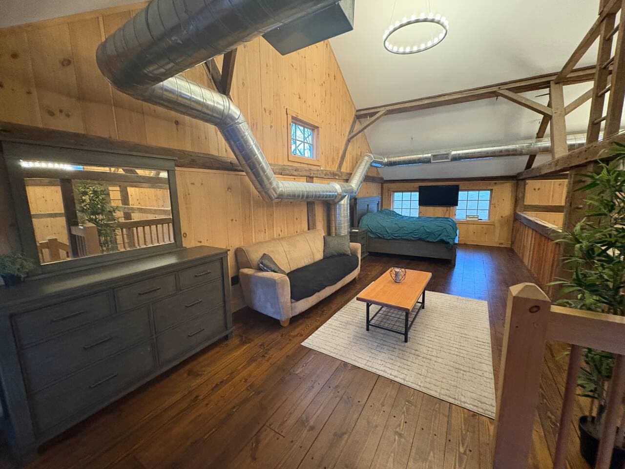 King bed overlooking the entire barn.   I view you will never forget.