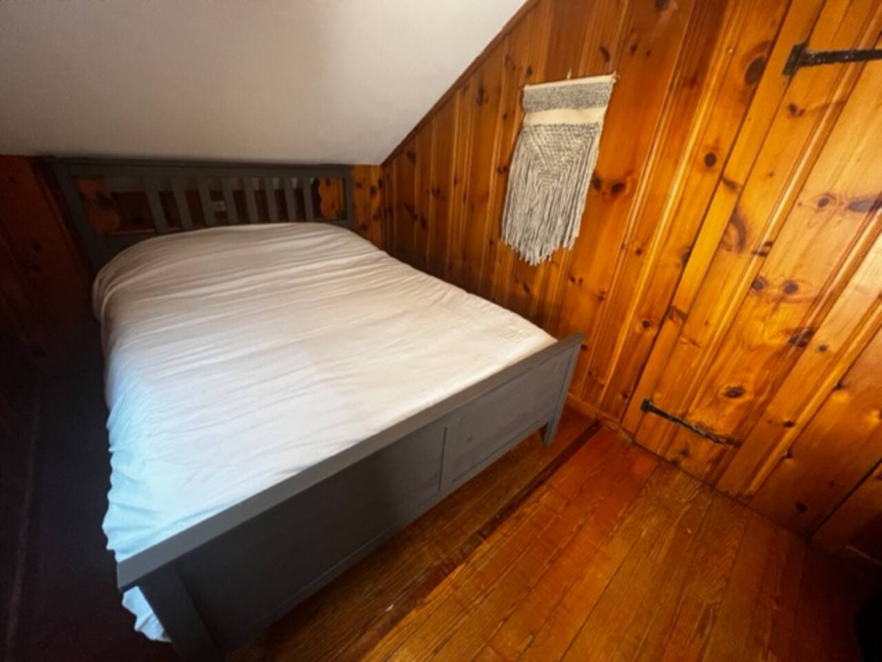 Bedroom with a wooded view