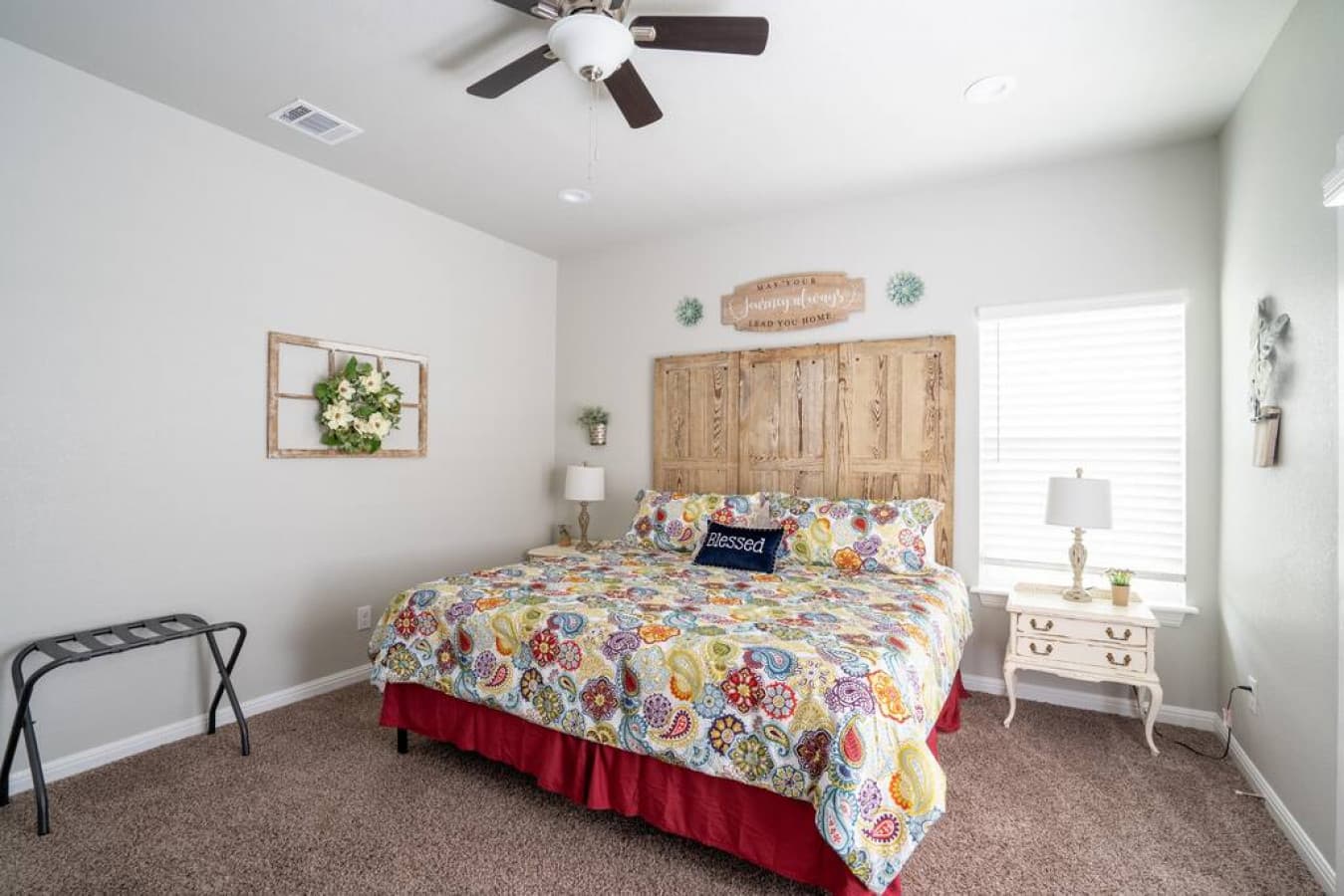 Master bedroom with king-size bed and ensuite bathroom.